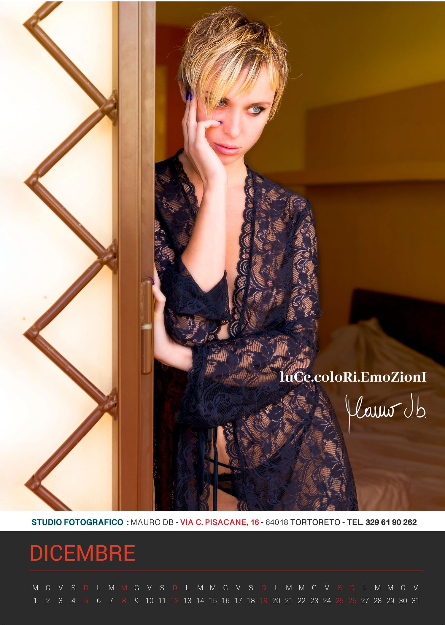 Fashion calendar photo showcasing black lace outfit in interior setting for December.