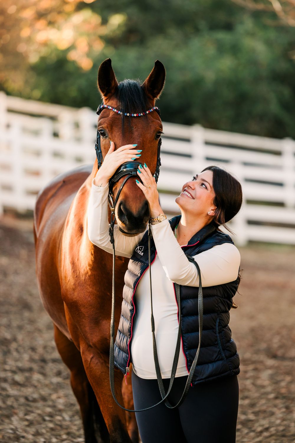 A joyful interaction showing the special bond between horse and rider during a sunny afternoon photoshoot.