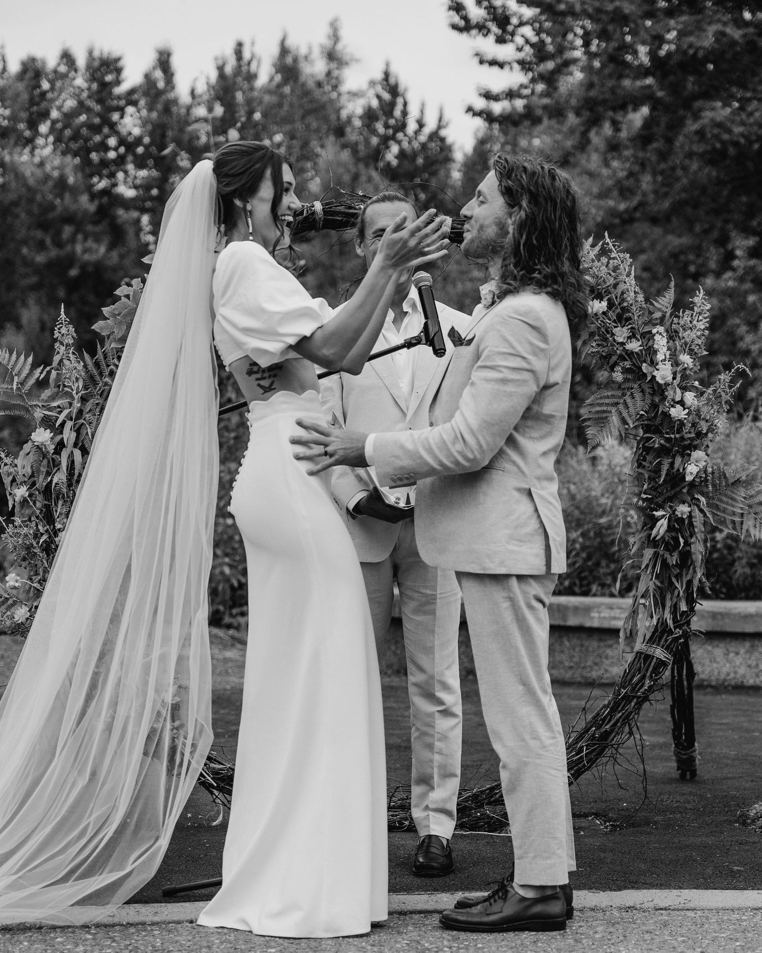 Couple sharing first kiss | wedding photographer
