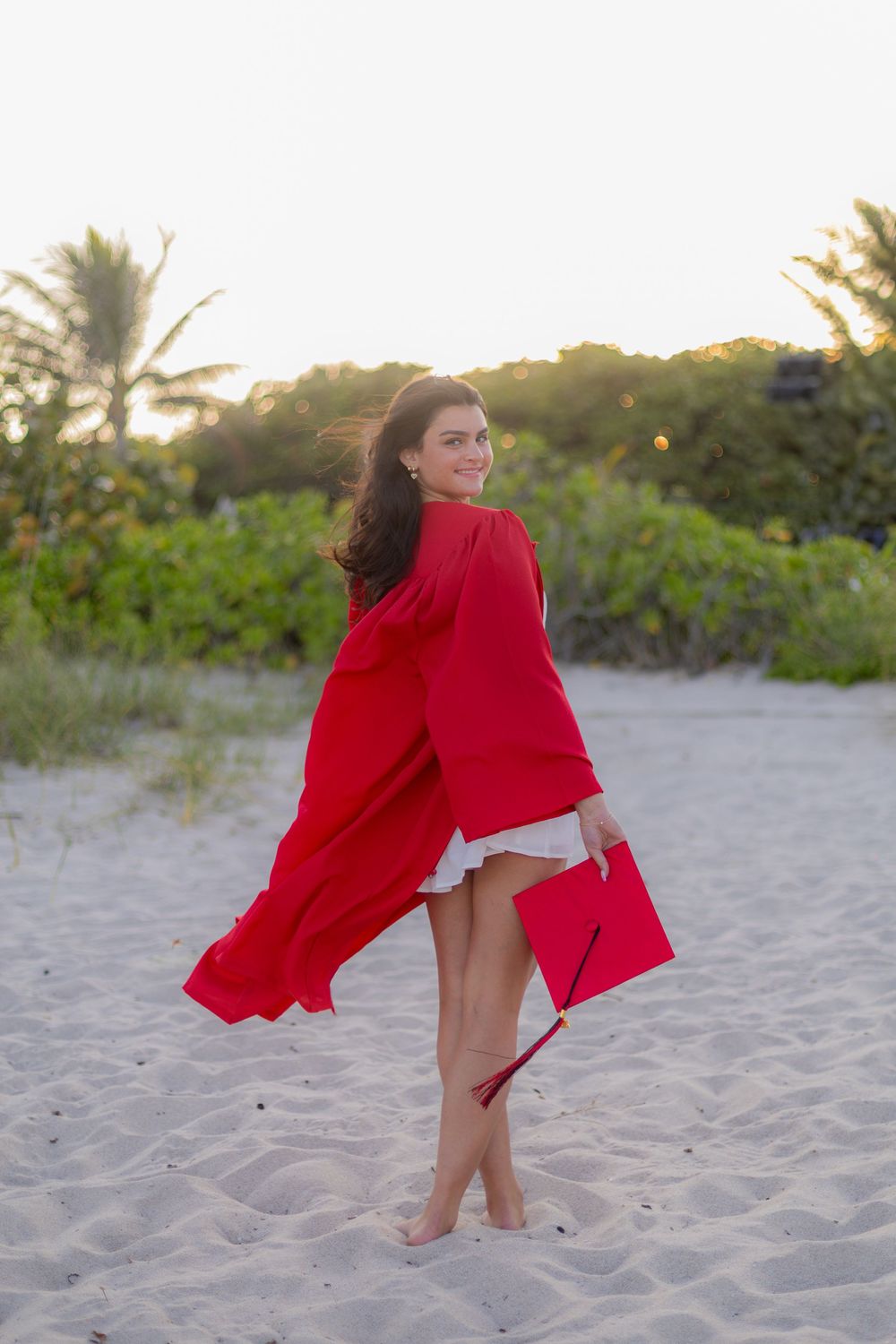 Girl posing for senior portraits at Fort Lauderdale Beach