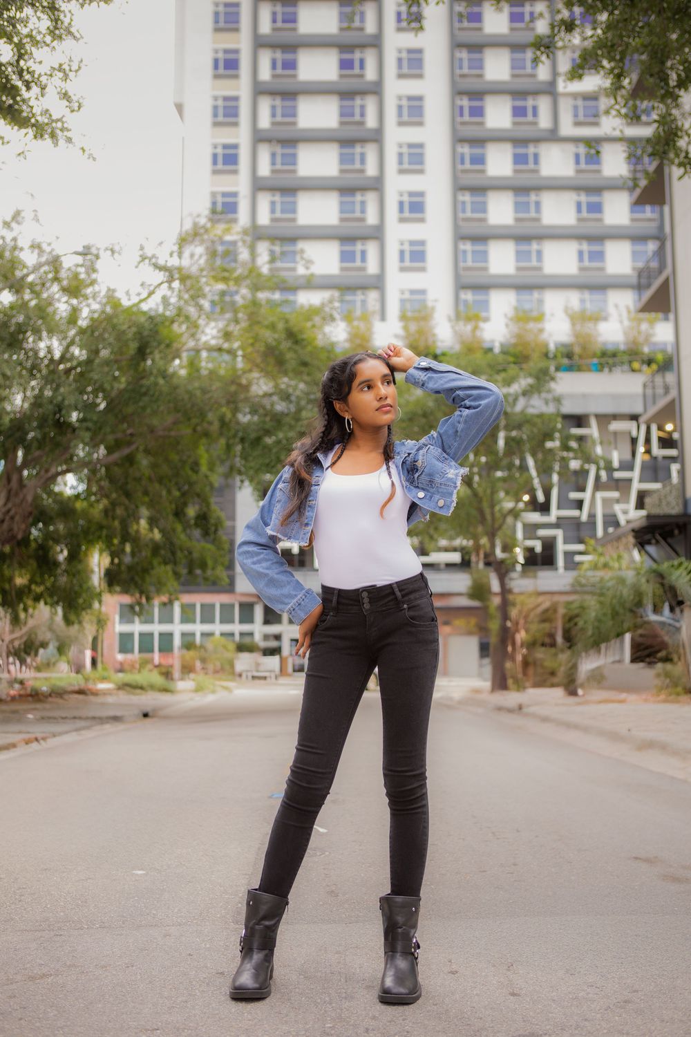 Girl posing for senior portraits downtown Fort Lauderdale