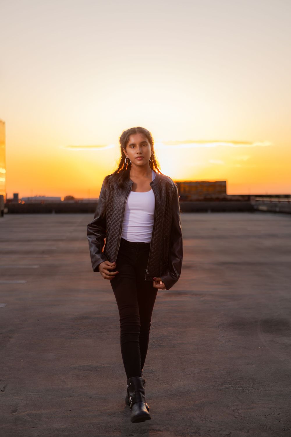 Girl posing for senior portraits on rooftop downtown fort lauderdale