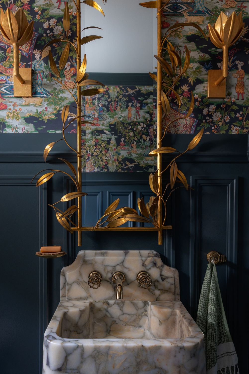 Tudor renovation Whitefish Bay Wisconsin by Catron Haus Design moody rich powder room