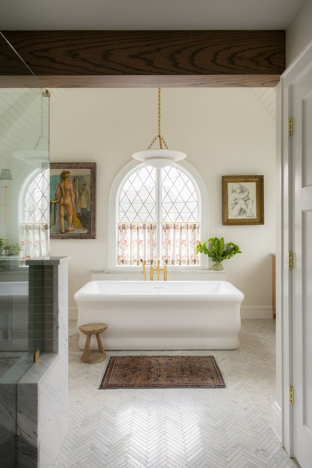 Tudor renovation Whitefish Bay Wisconsin by Catron Haus Design statement primary bathroom retreat