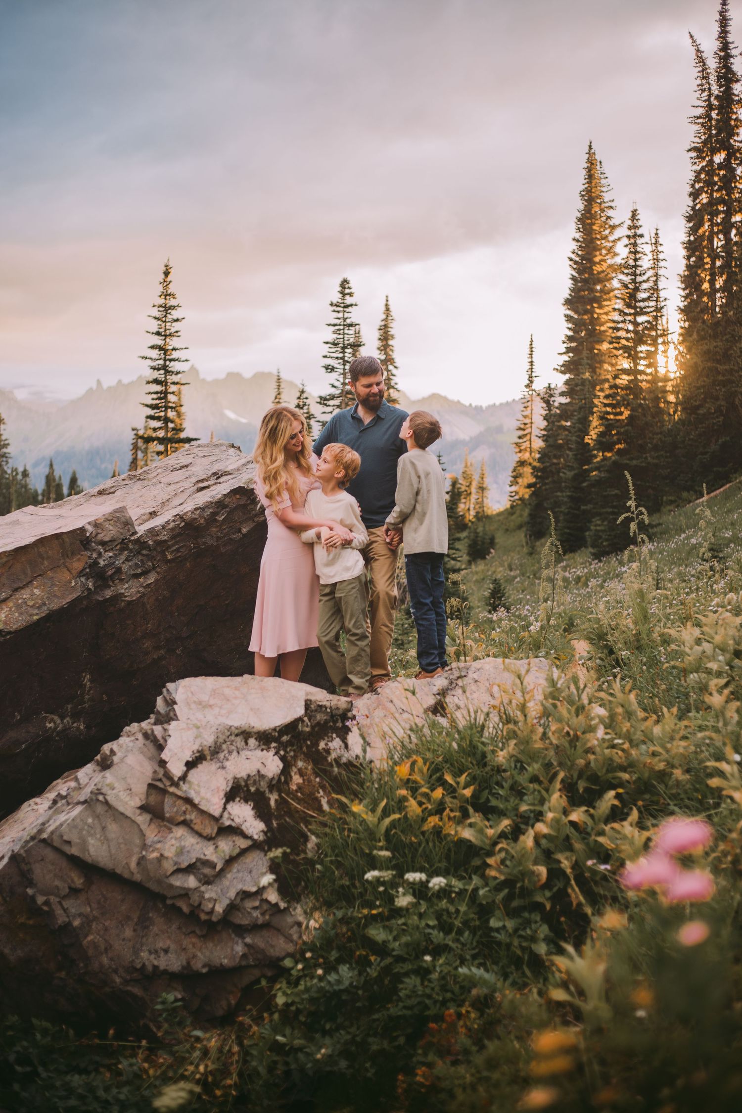Family standing together during their adventure and family photoshoot at Mt. Rainier National Park near Seattle, Washington