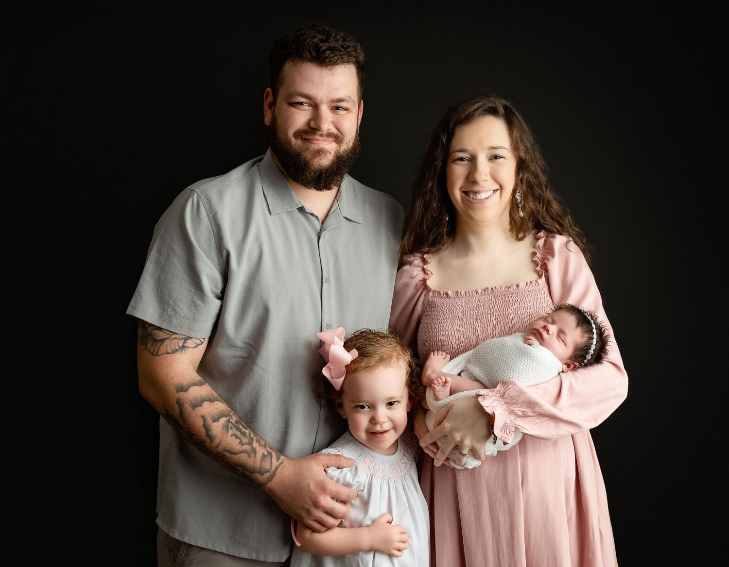 Precious family holding newborn girl. Greenville, SC newborn photographer, Easley, SC newborn photographer, Upstate, SC newborn photographer