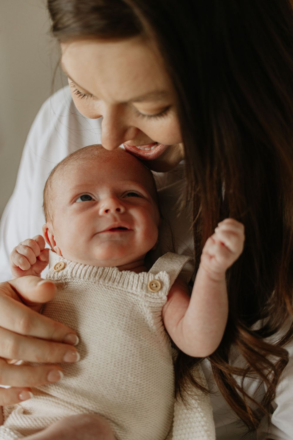 Mother and baby in newborn photoshoot in Ashford Kent