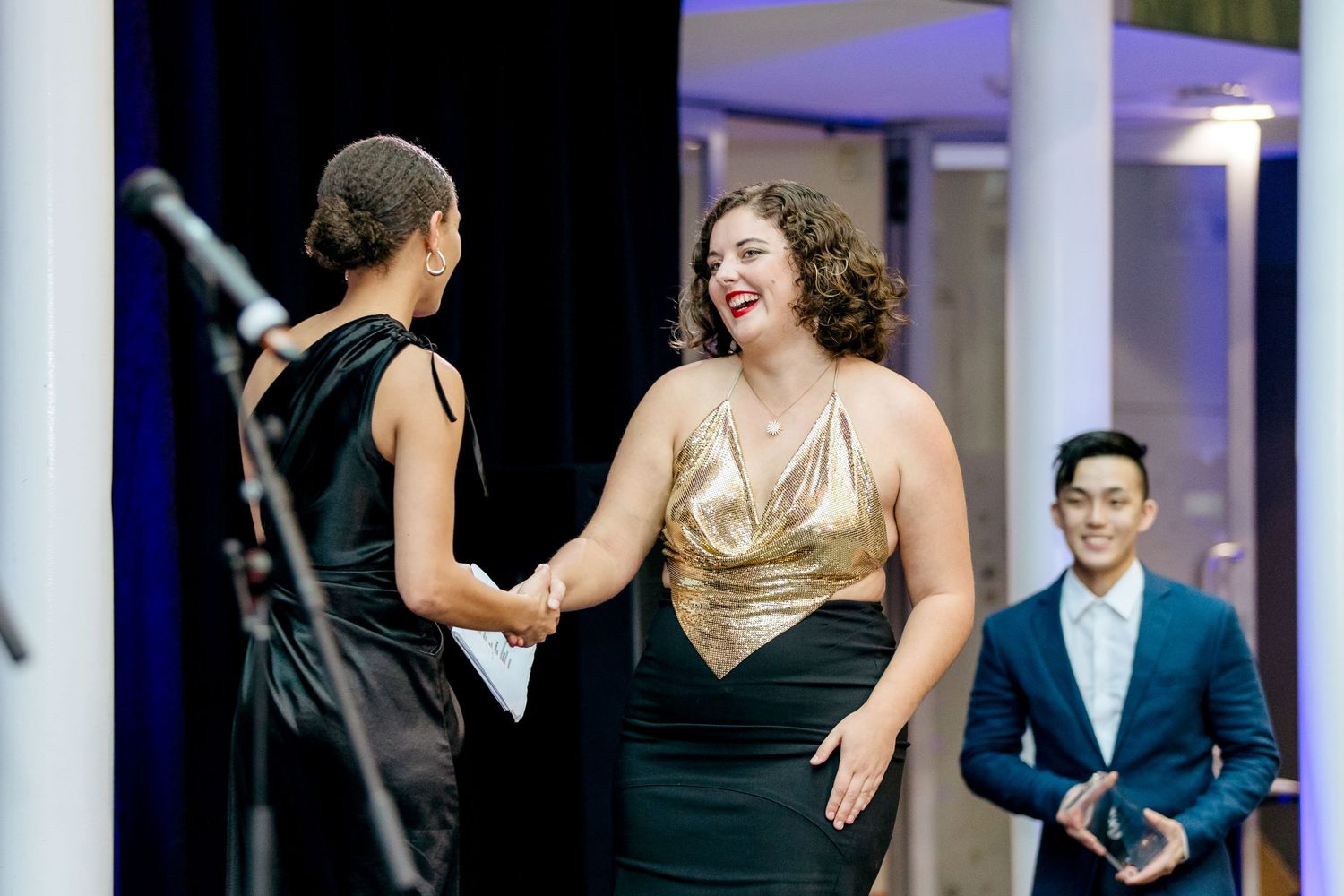Awards presentation on stage at Auckland corporate awards night