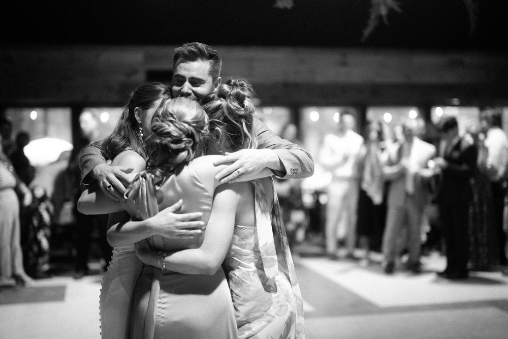 Two people dance together in an intimate embrace during a romantic ballroom dance performance.