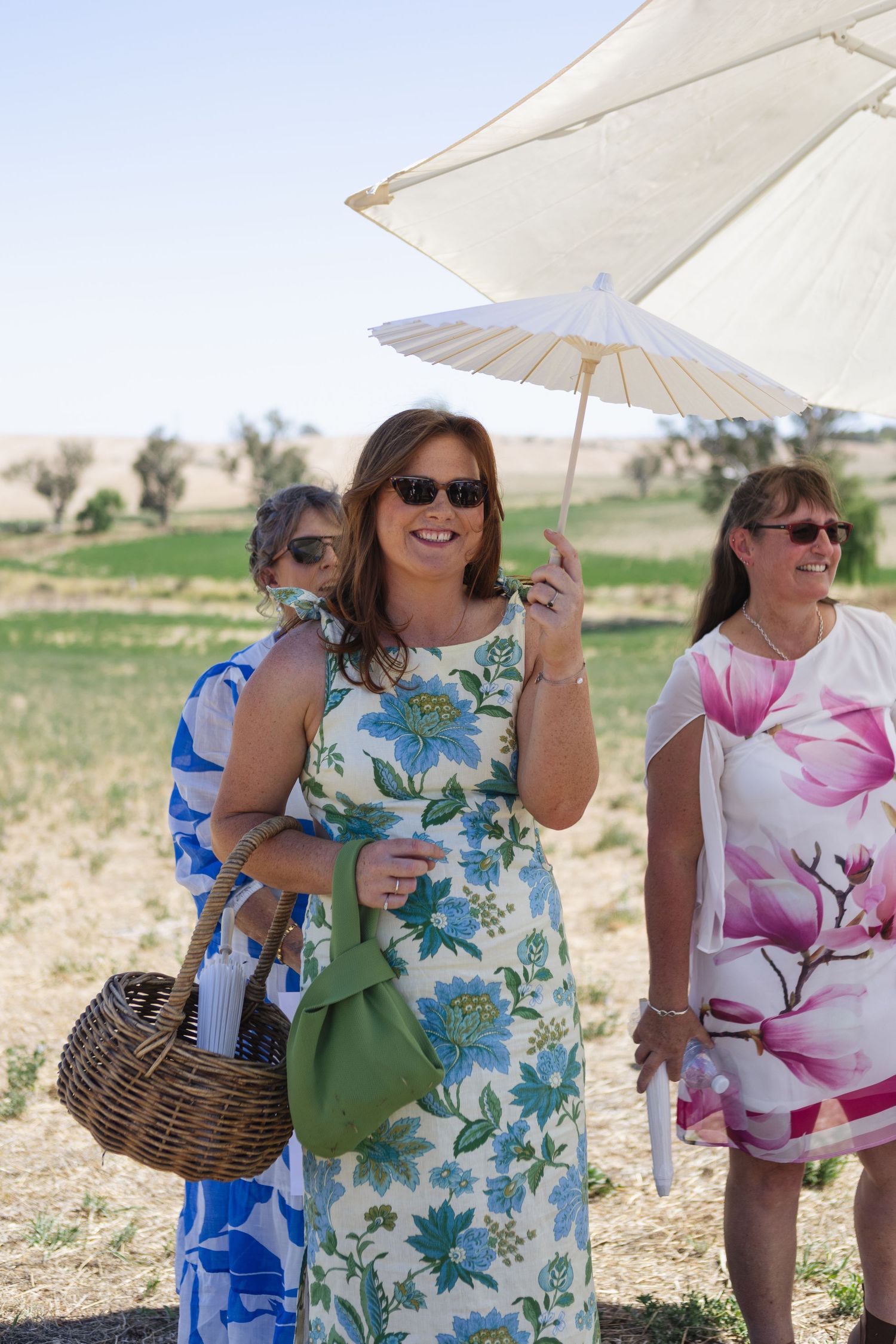 lady holding umbrella after ceremony at country NSW wedding
