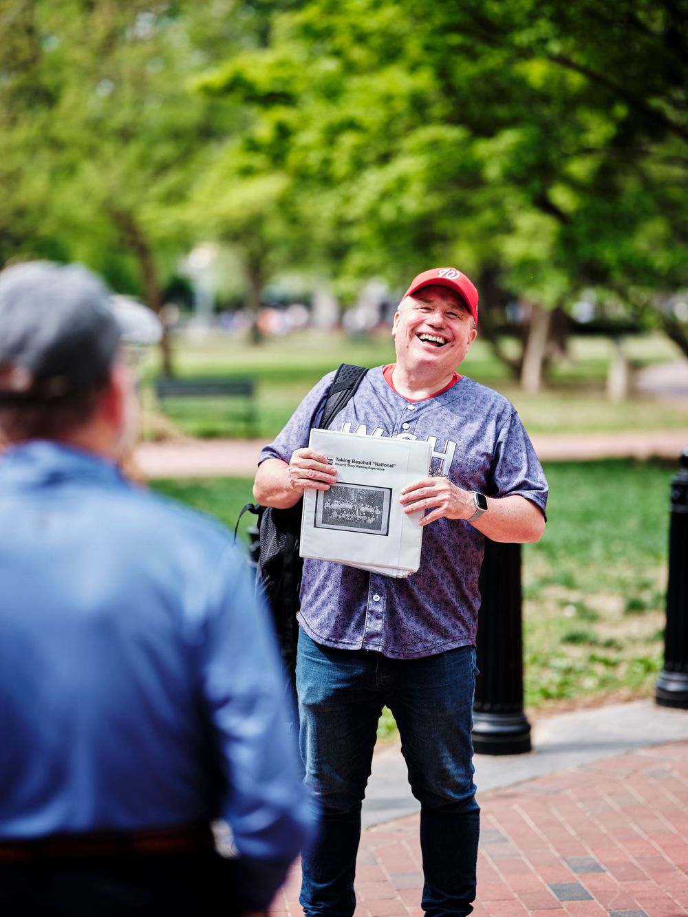 Friendly headshot of tour guide at Lafayette Park, Washington DC. Commercial photography.