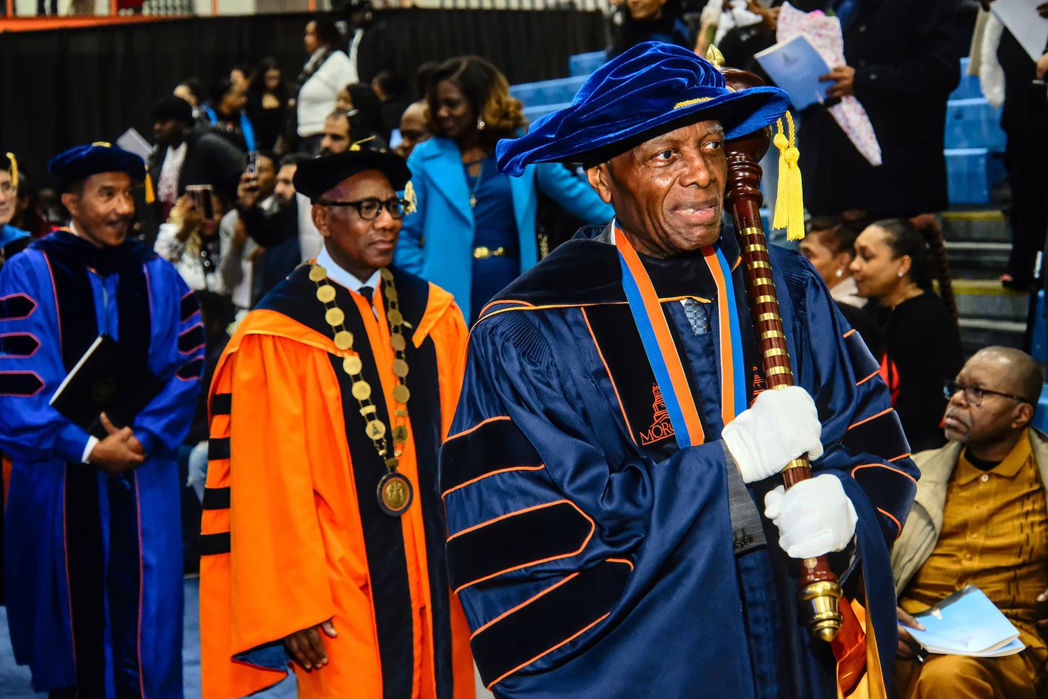 Morgan State University Provost leading commencement processional with ceremonial mace. Higher Ed photography.