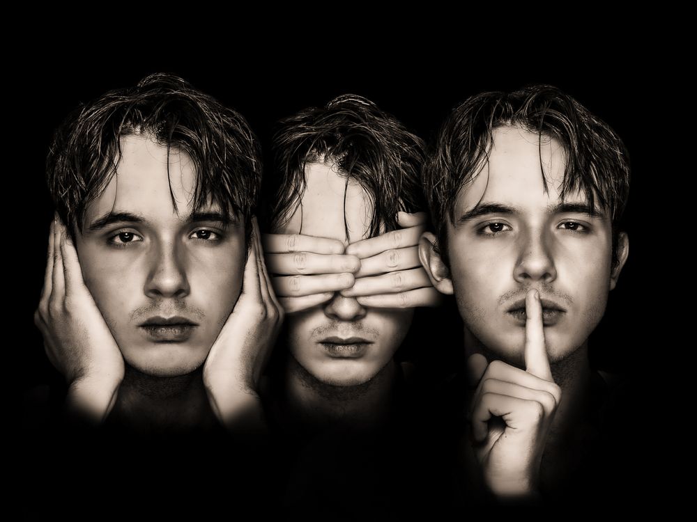 Three artistic black and white portraits depicting themes of hear no evil, see no evil, speak no evil in dramatic lighting.