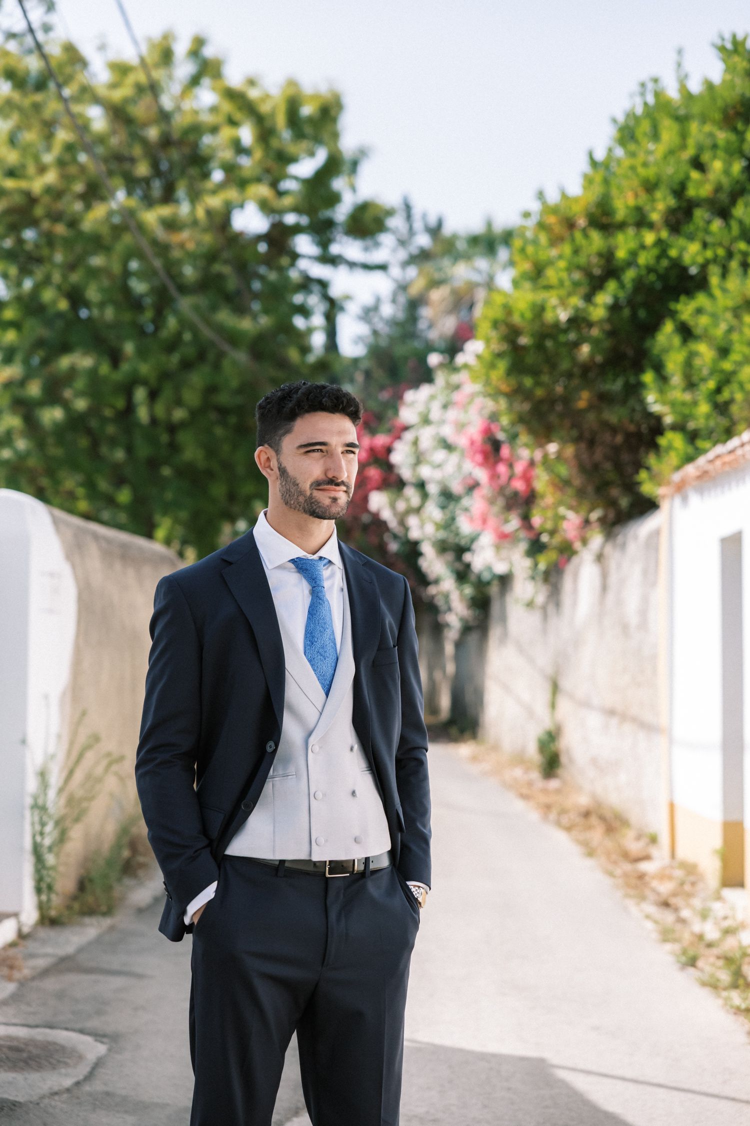Modern groom portrait in Portugal wedding setting