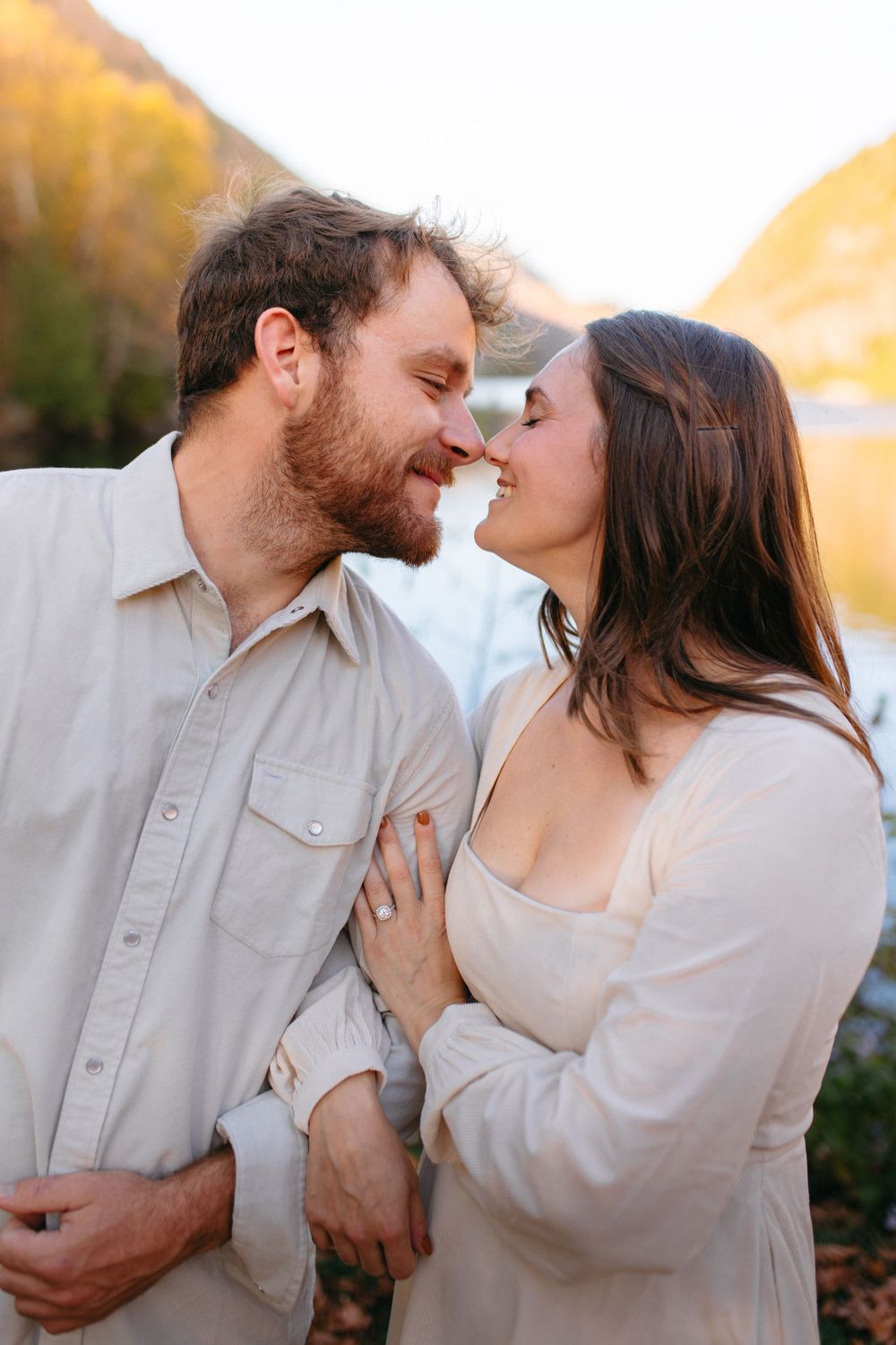 A couple shares intimate moments in a series of candid photos during golden hour sunset.