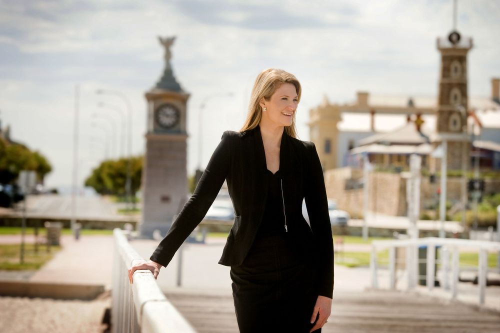 Outdoor business portraits taken in front of architectural landmarks.