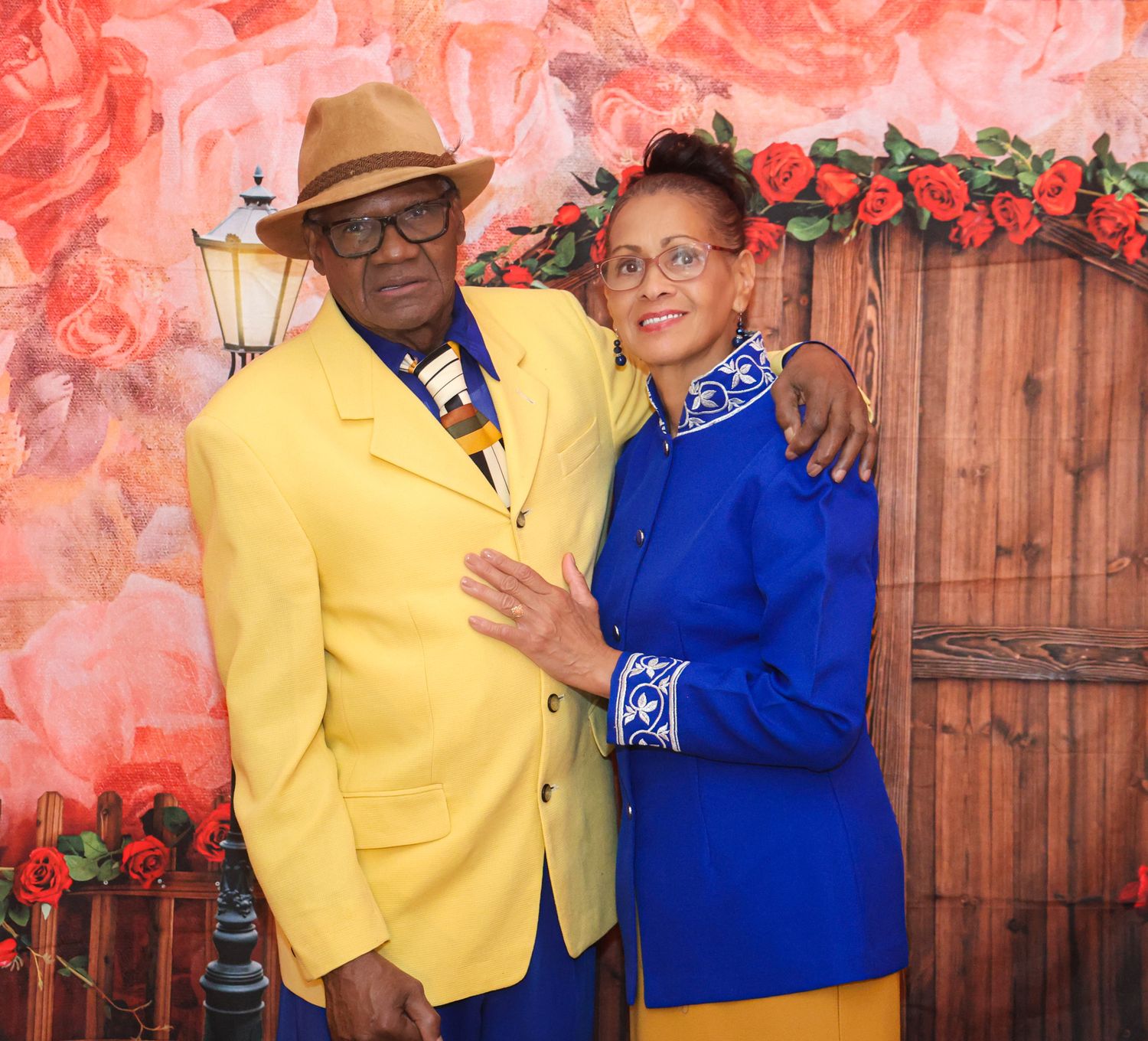 Formal portrait series featuring coordinated outfits in yellow and blue against a decorative background.