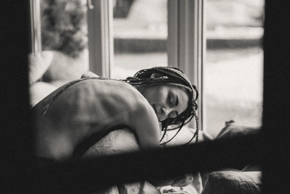 Black and white window light photography series with soft natural illumination.