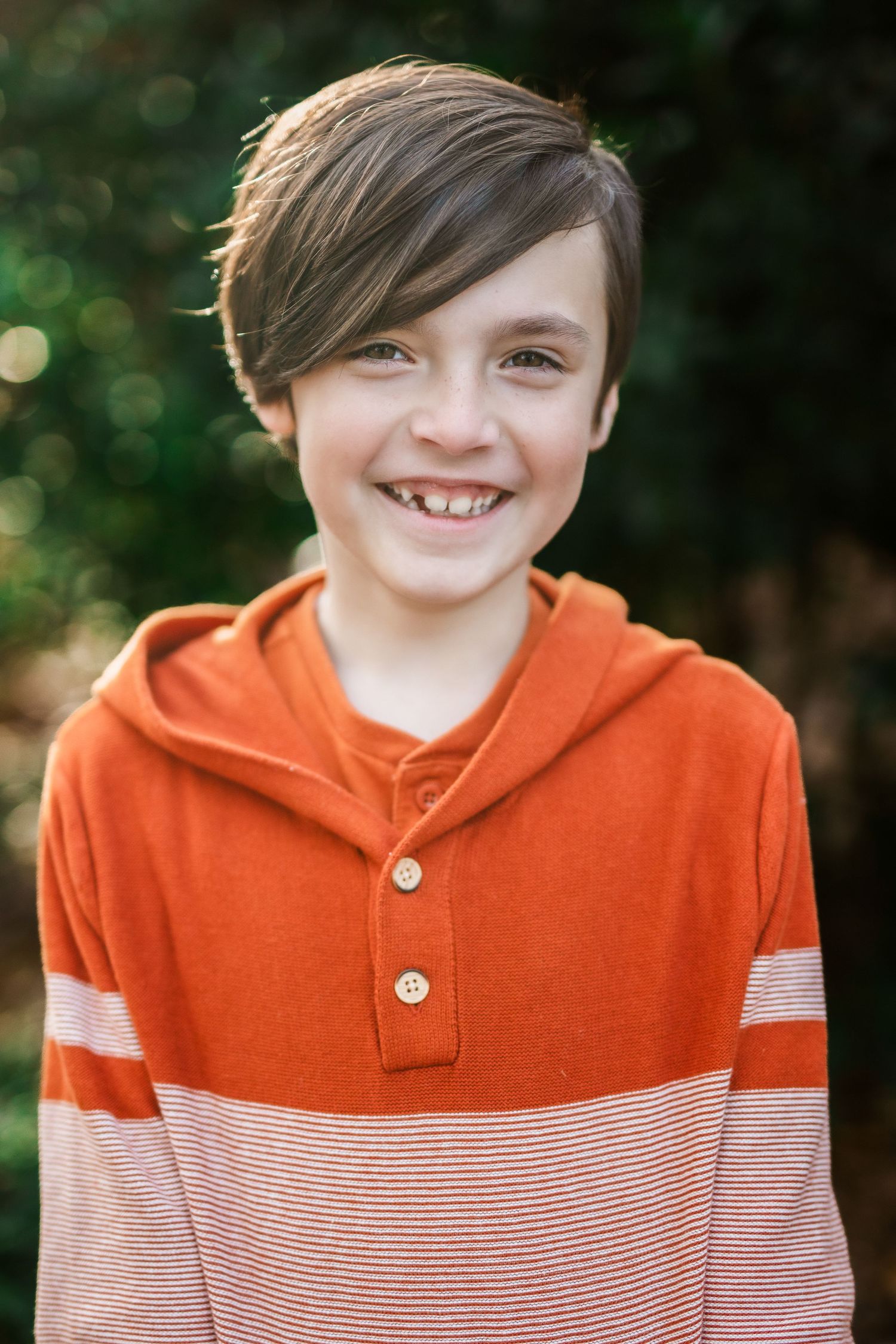Outdoor child portrait captured in natural light in Amherstburg, Ontario, showcasing personality and joy.
