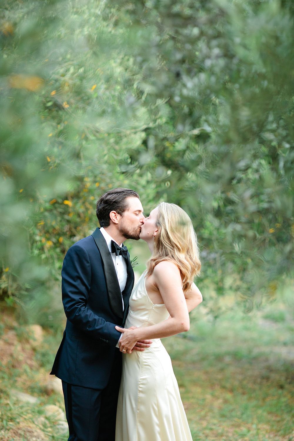 Bride and groom portrait in an olive garden during an Italian Riviera wedding
