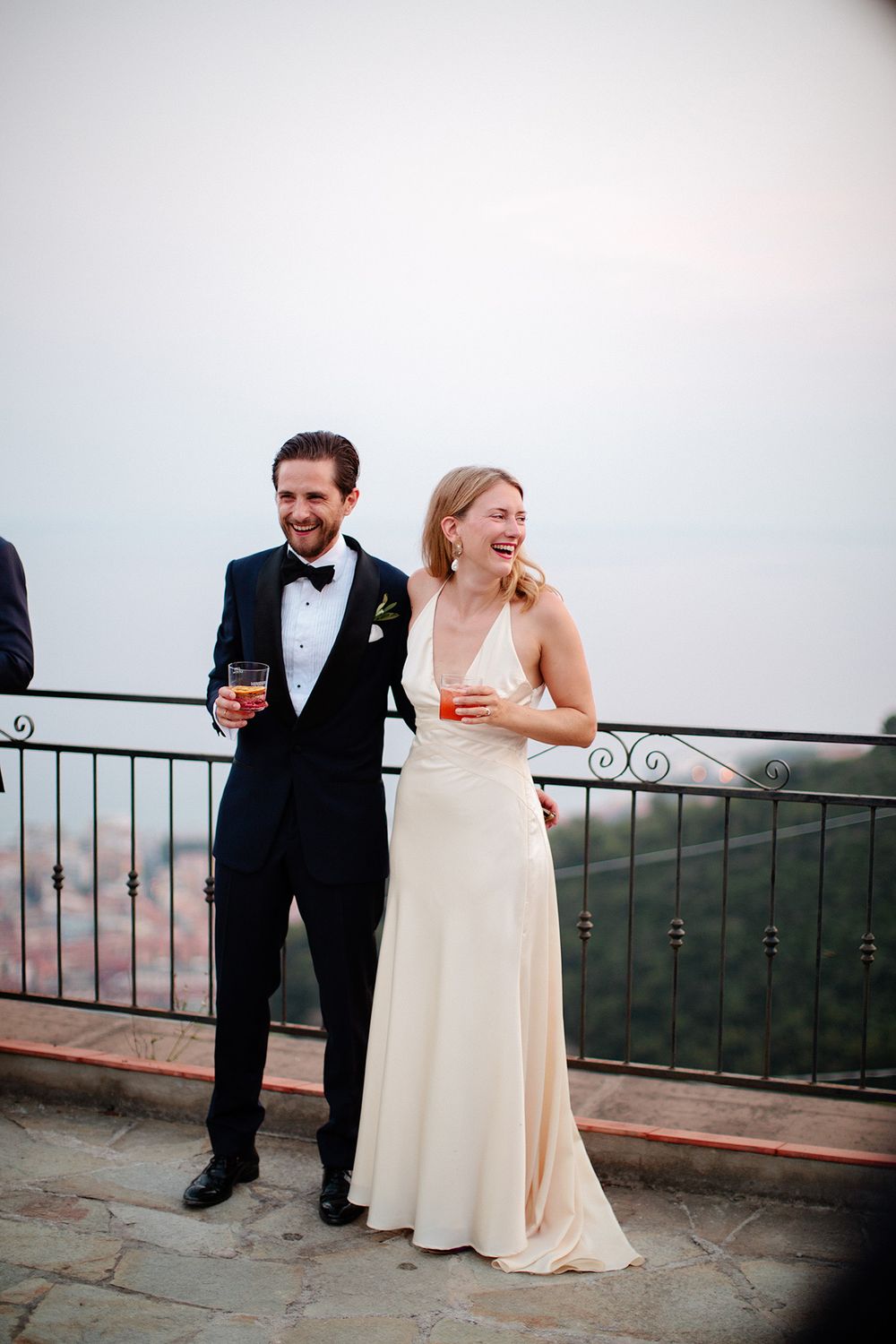 Bride and groom during sunset cocktails at a villa wedding in Ventimiglia