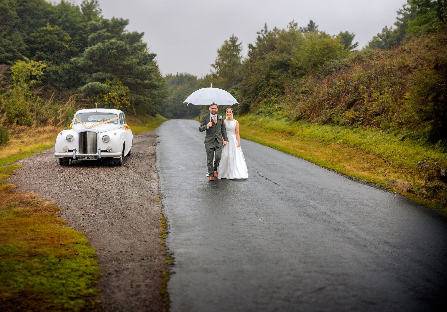 Documentary wedding photography on a rainy wedding day.