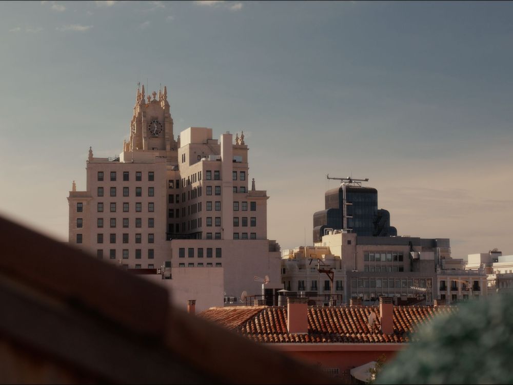 Aerial panoramic view of historic art deco buildings along Ocean Drive in Miami Beach during sunset.