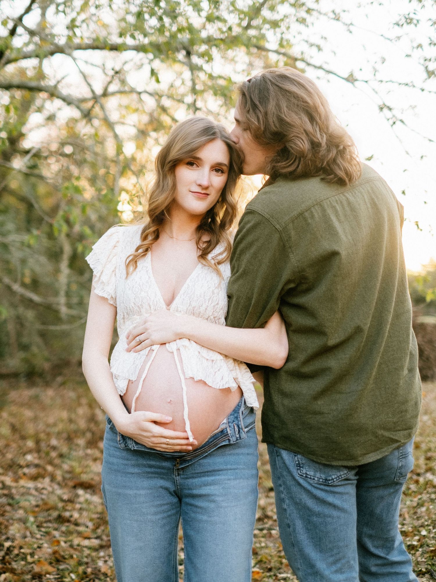 Lifestyle maternity photography capturing parents-to-be at Sheffield Park Jacksonvill