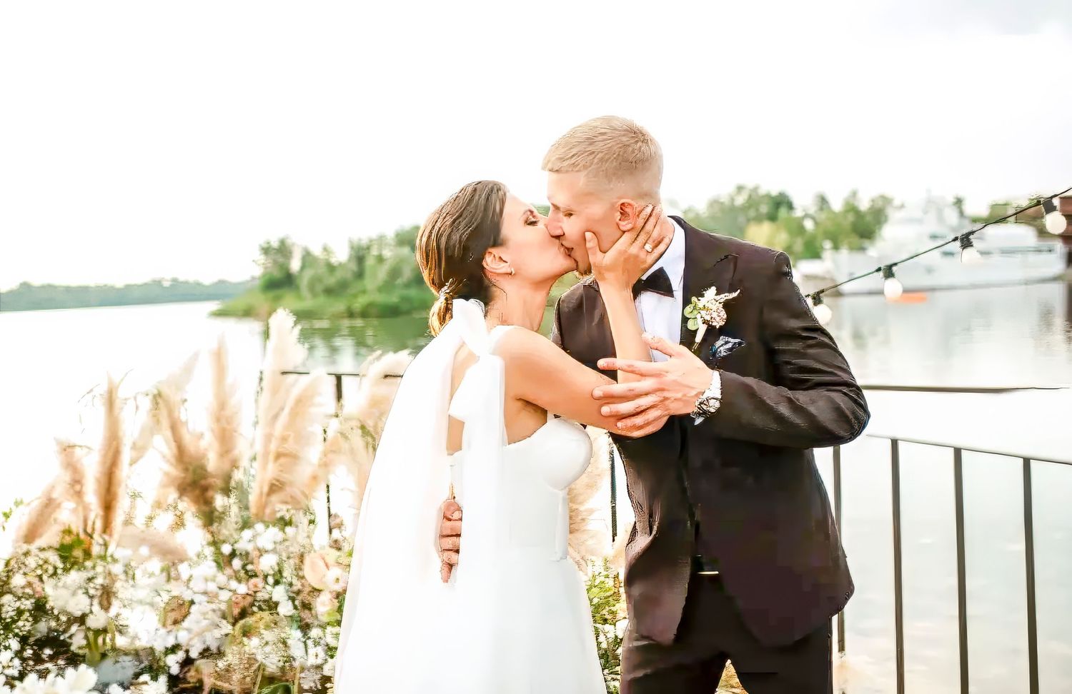 A romantic couple shares tender moments in a series of wedding photos outdoors with scenic backdrops.