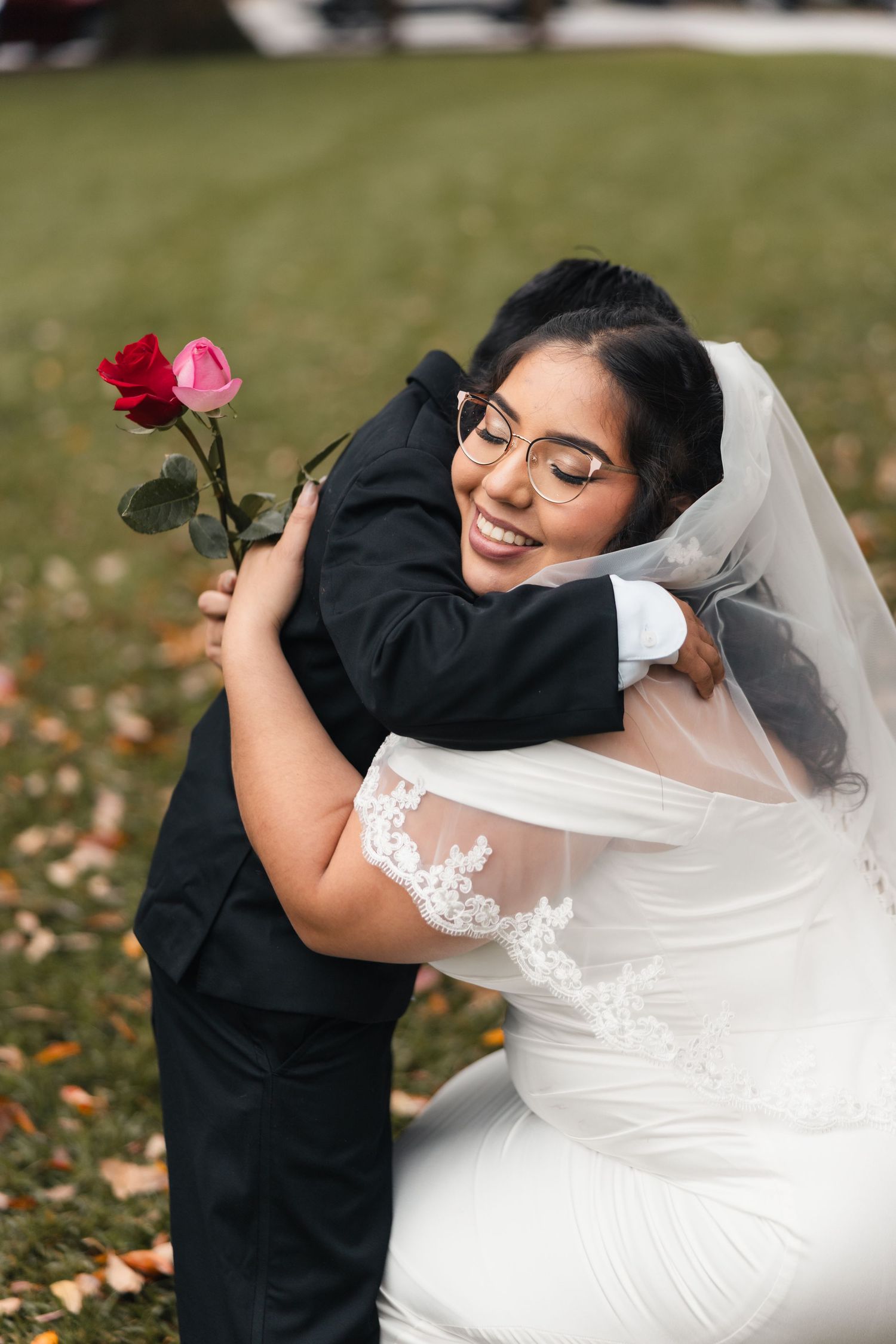 A sequence of wedding photos shows a bride in white dress hugging a young boy in black suit holding a pink rose.