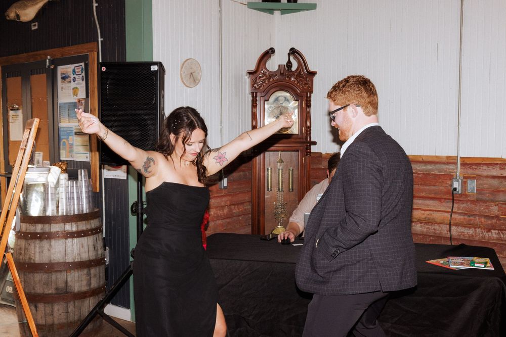 Candid reception photos at Port Rexton Brewery by Newfoundland documentary style wedding photographer Kaitlyn Yvette