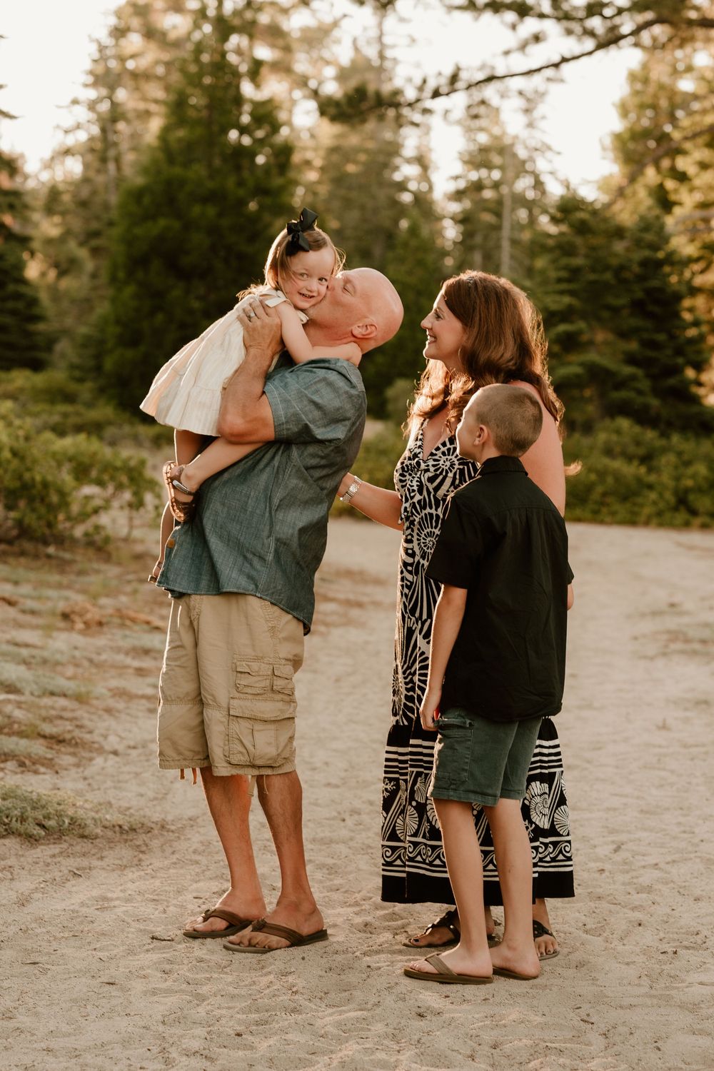 A series of candid outdoor family photos showing intimate moments between parents and children on a sandy path at sunset.