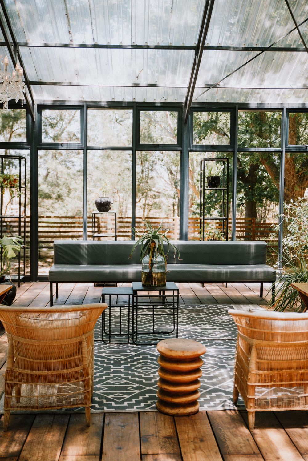 Elegant minimalist wedding decor at Die Woud Wedding Venue featuring king proteas and olive leaves in a refined, natural styling
