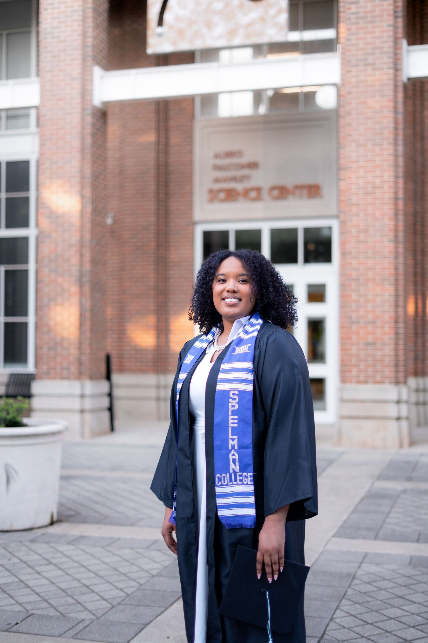 Spelman graduation photos in front of the iconic Sciences Building, one of the best spots on the Atlanta campus