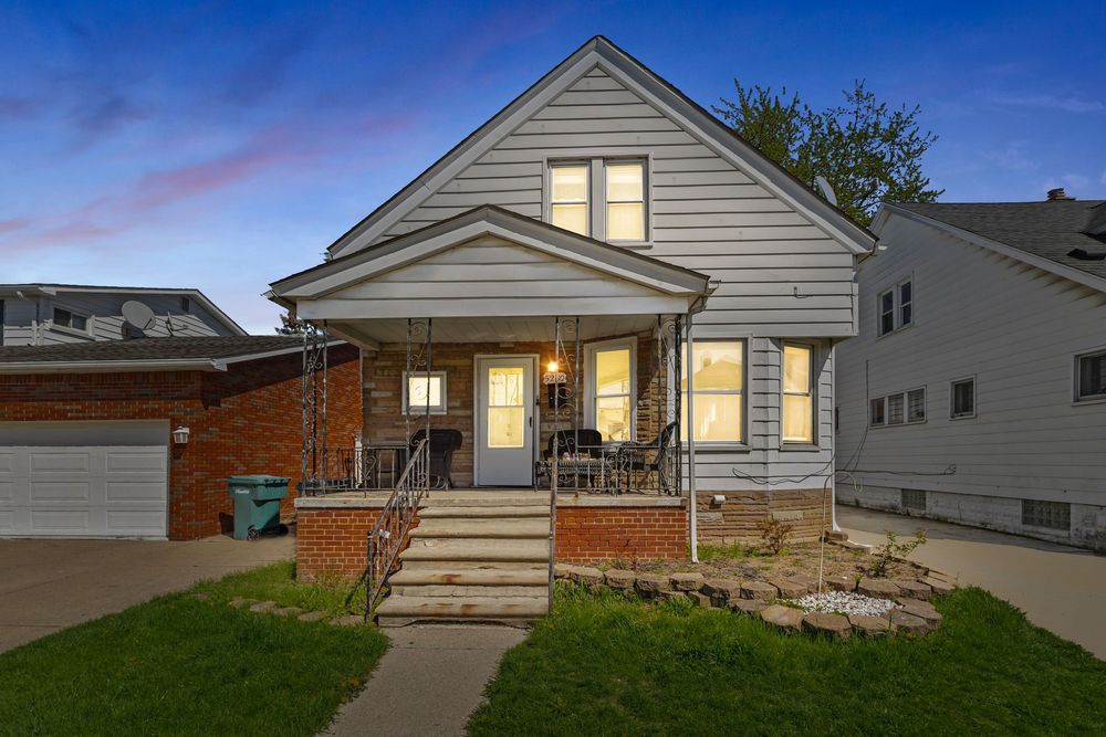 Front exterior of bungalow with covered porch on Williamson Street Dearborn Michigan