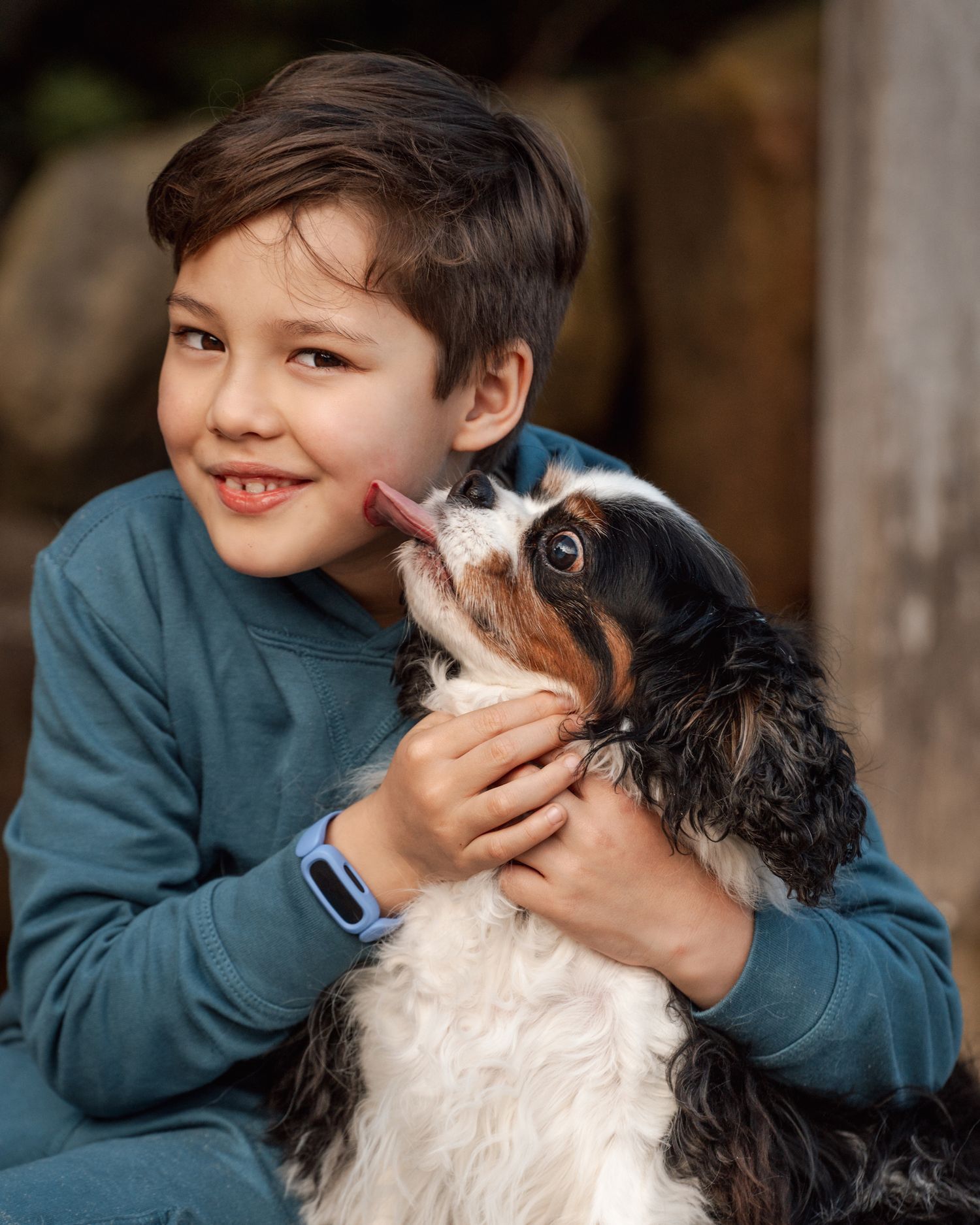 a boy and his cavalier dog captured during a family photoshoot in Mosman Sydney