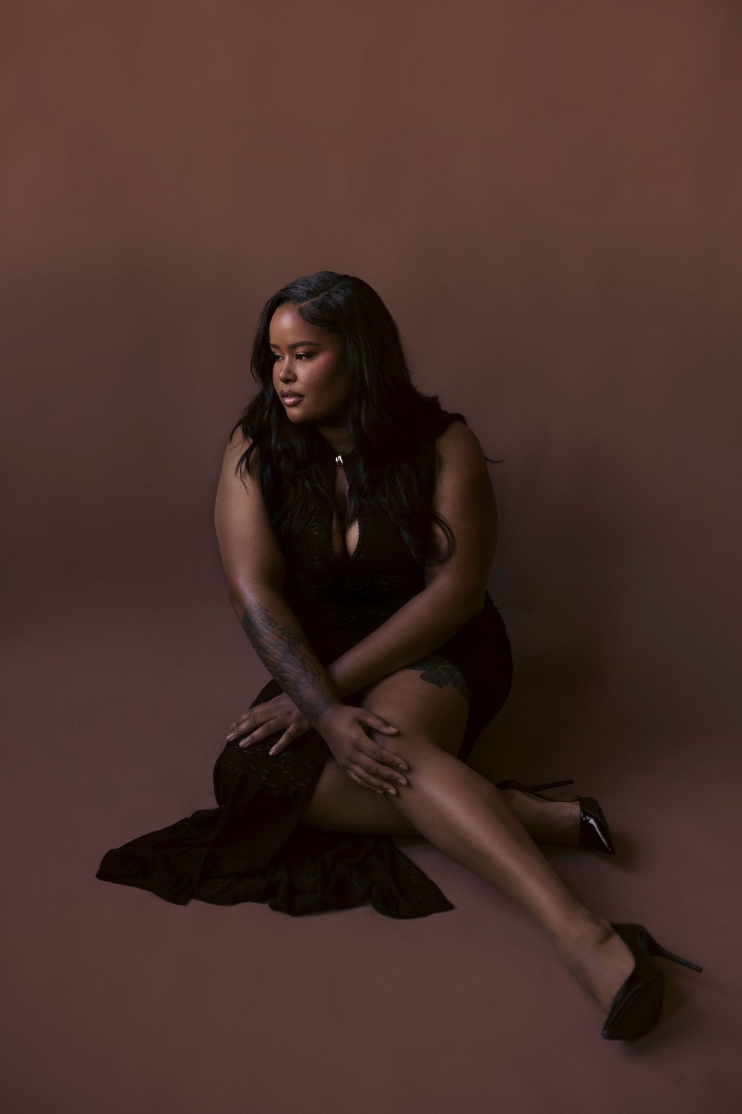 Artistic studio portrait series showing silhouetted figure in dramatic poses against dark brown background.