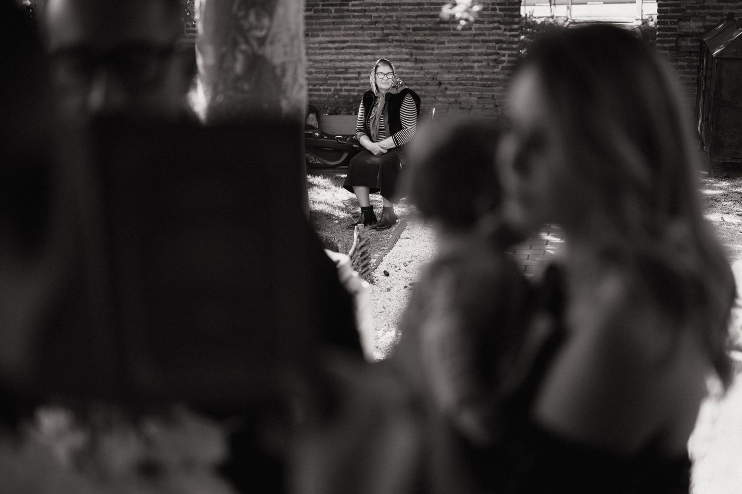 A black and white photo montage showing several overlapping images with blurred and grainy textures.