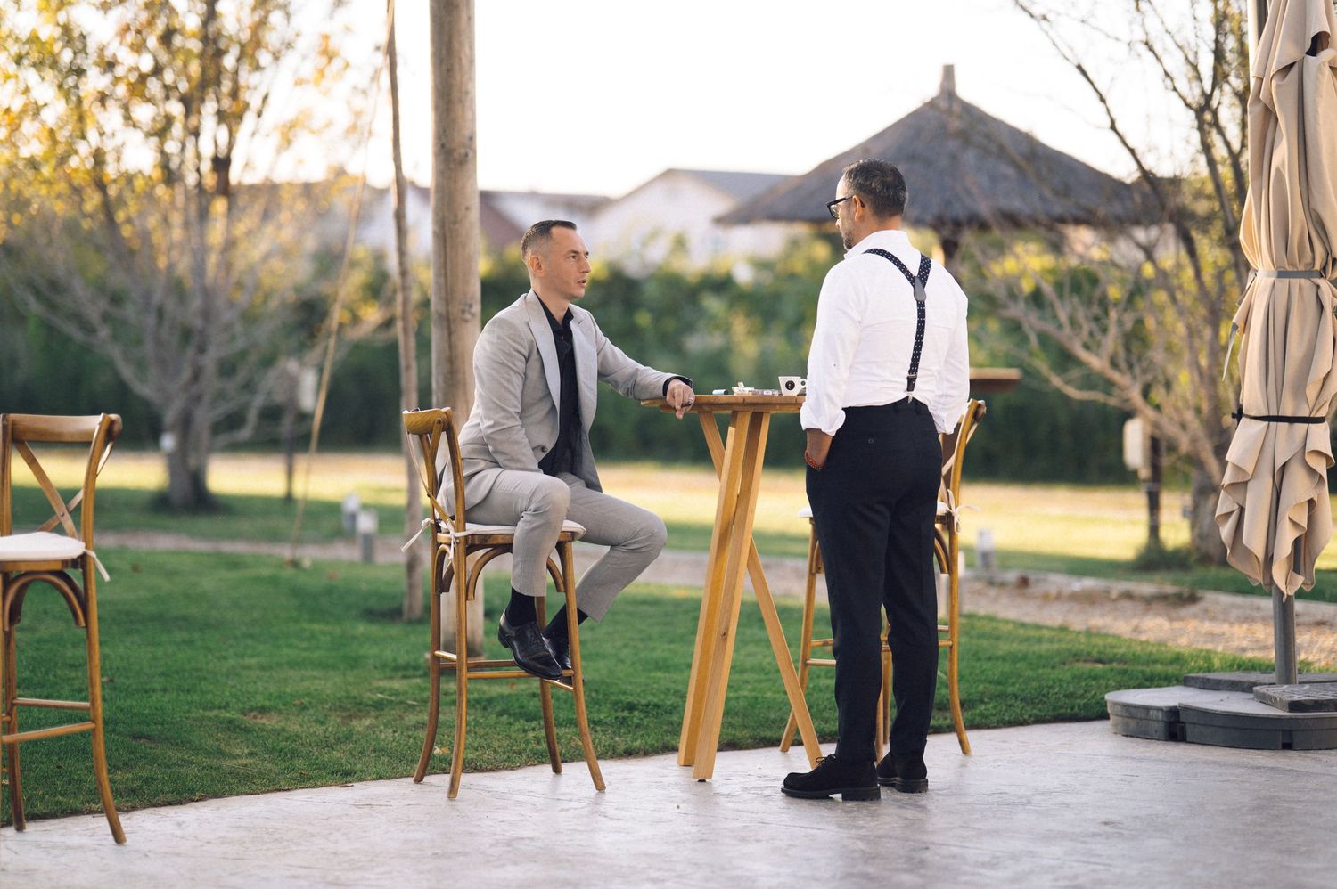 A series of romantic outdoor wedding photos showing couples embracing in a rustic garden setting at sunset.