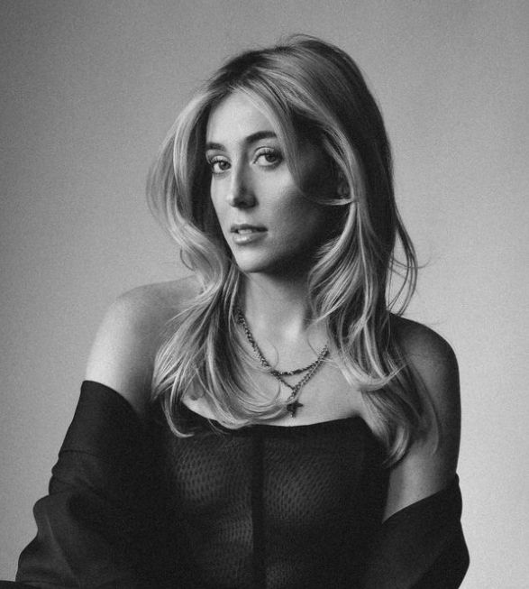 Black and white portrait series showing artistic poses in dark sweater against neutral background.