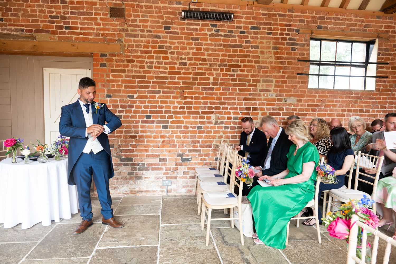 A series of photos inside a brick-walled venue showing people seated at tables during an event.