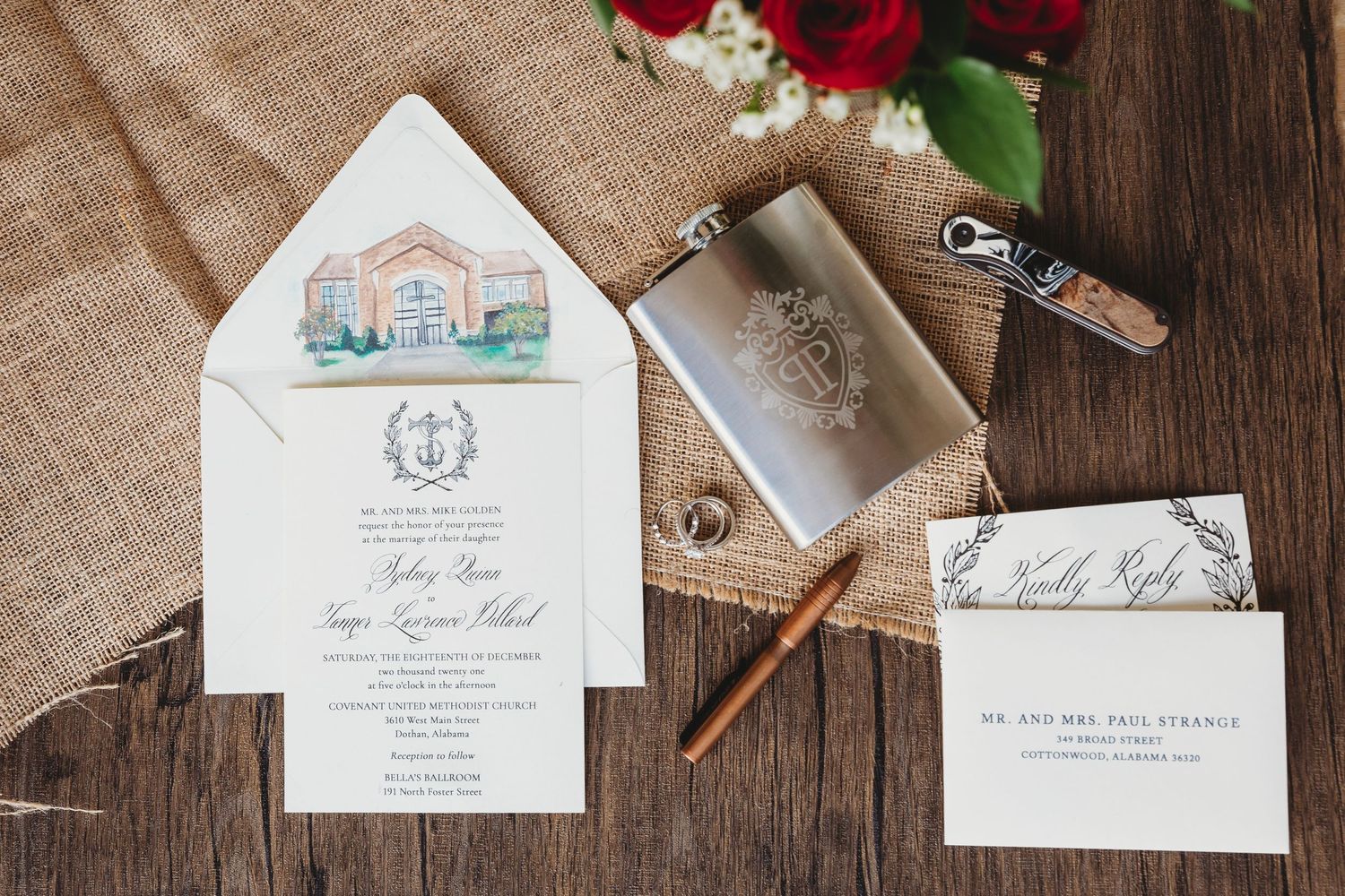 Wedding stationery collection featuring delicate illustrations, red roses, and rustic wooden background details.
