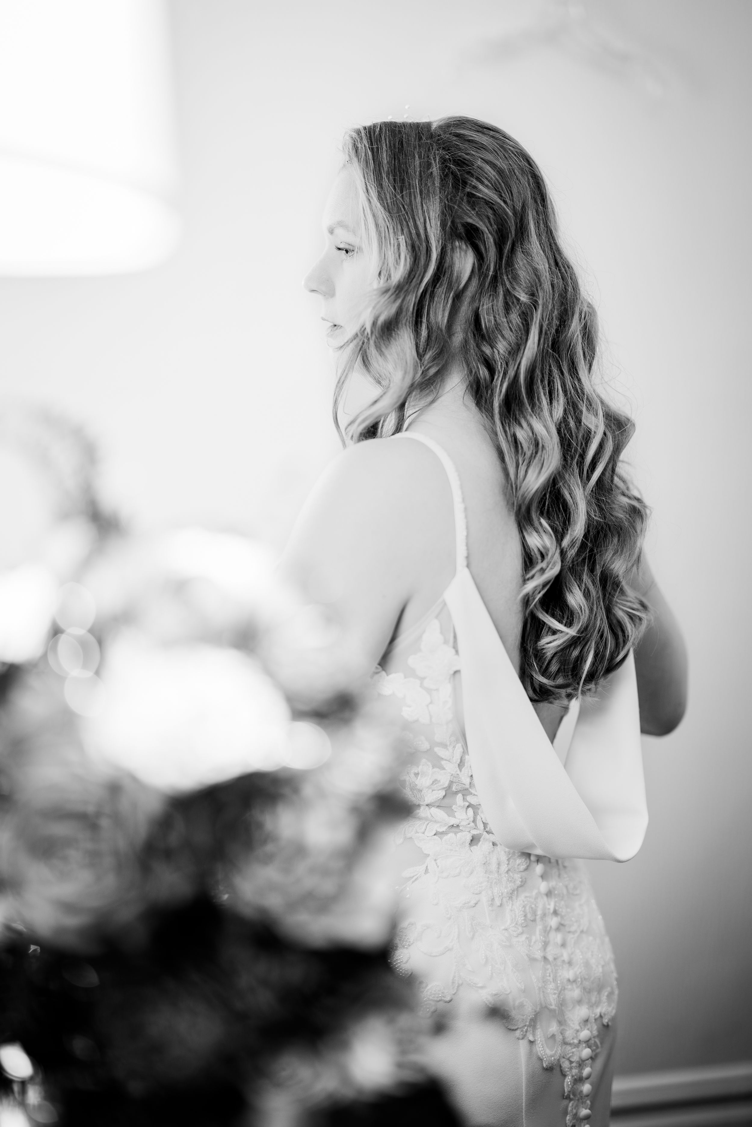 A dreamy black and white photo sequence shows a figure in profile with wavy hair against a soft blurred background.