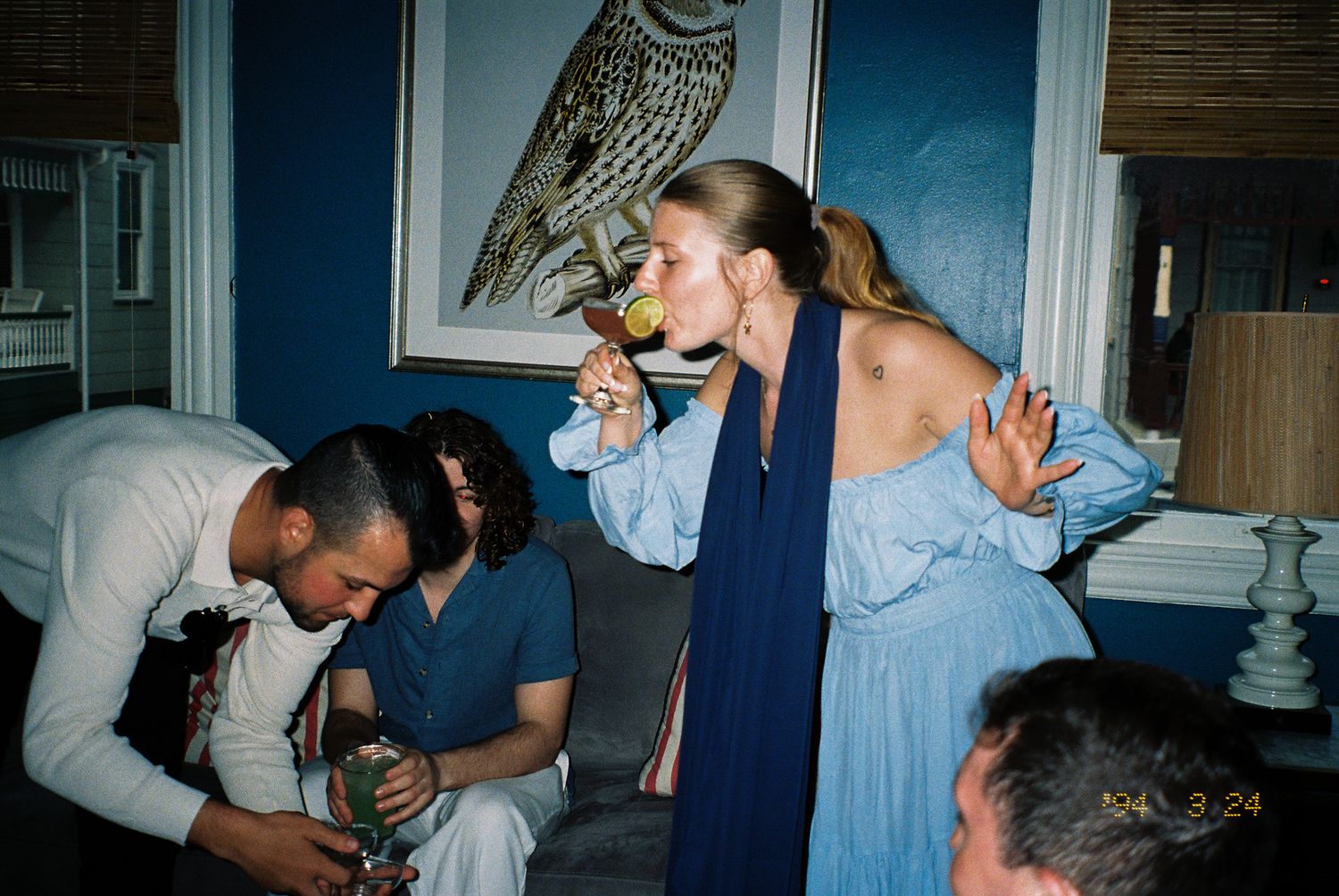 A sequence of four candid photos showing people dancing and embracing at what appears to be a party or celebration.