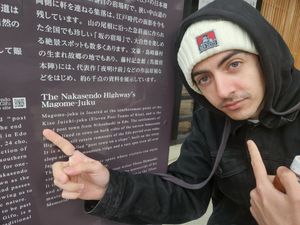 Japanese text panels and signage displayed in what appears to be a museum or gallery setting.