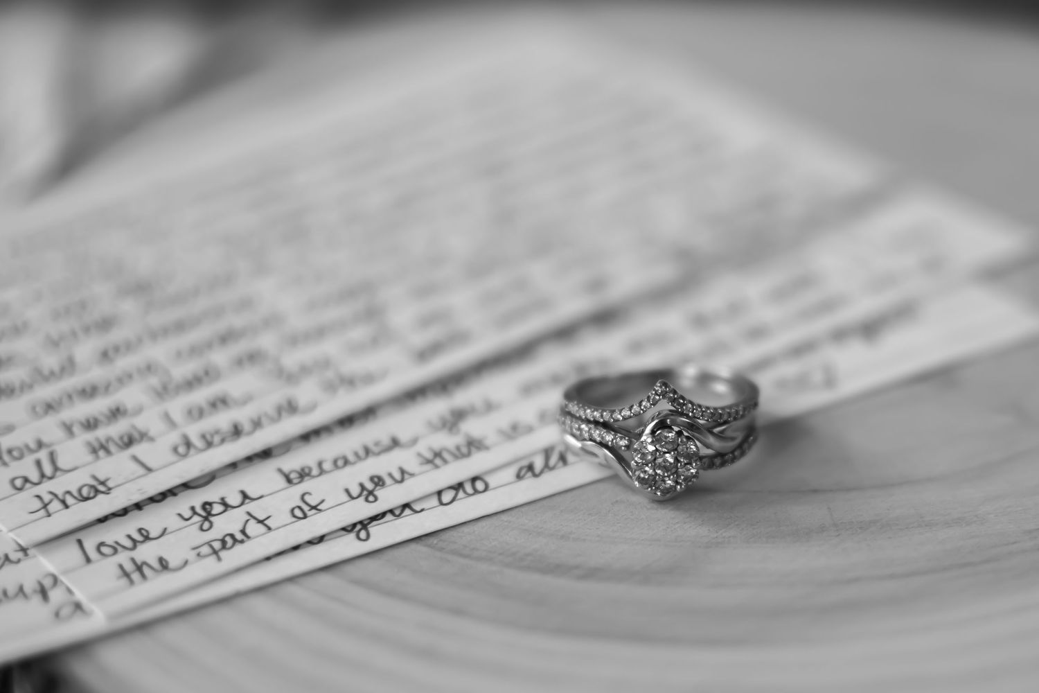 A close-up view of handwritten notes on white paper with shallow depth of field.