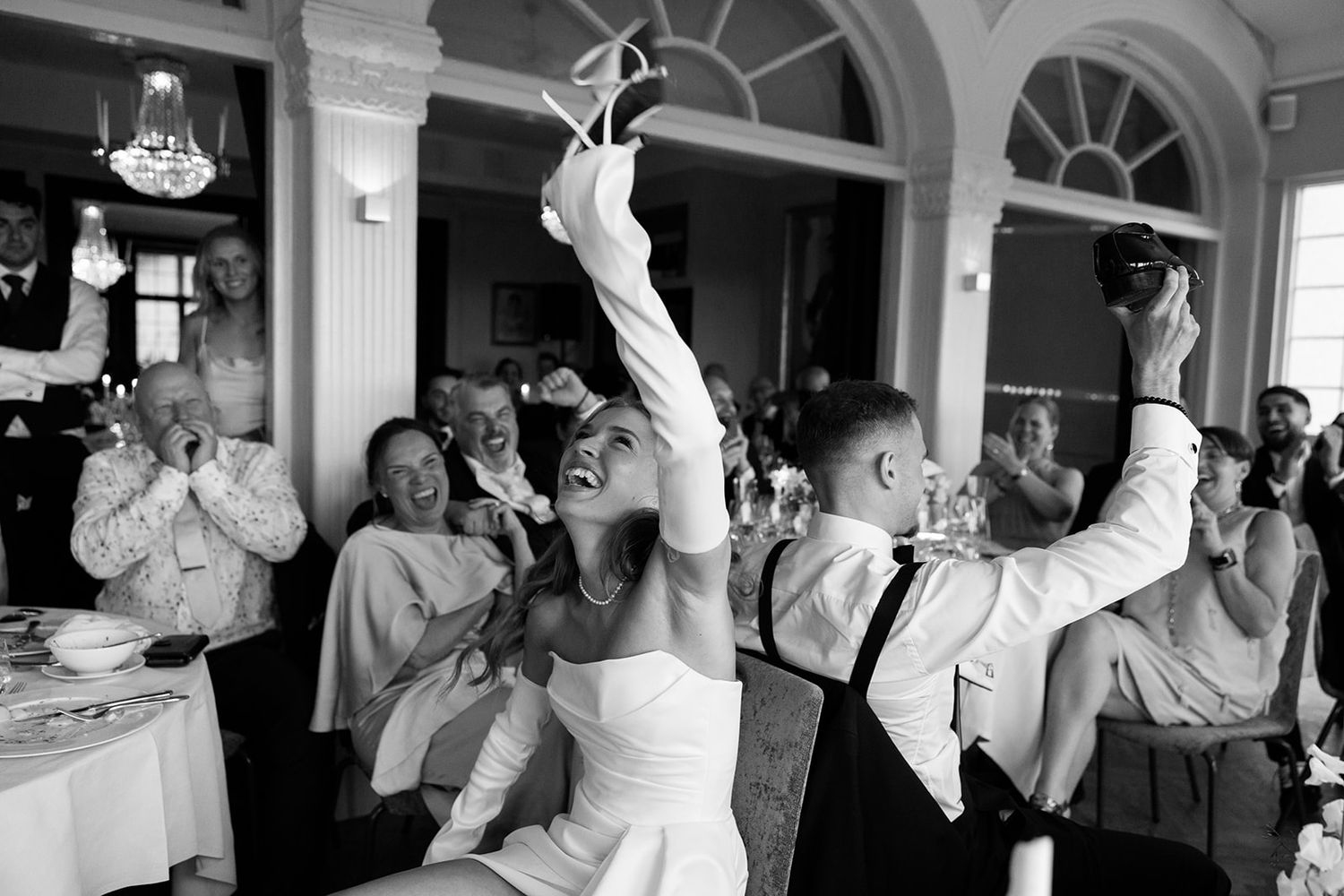 A sequence of black and white photos showing wedding guests reacting emotionally during a celebration.