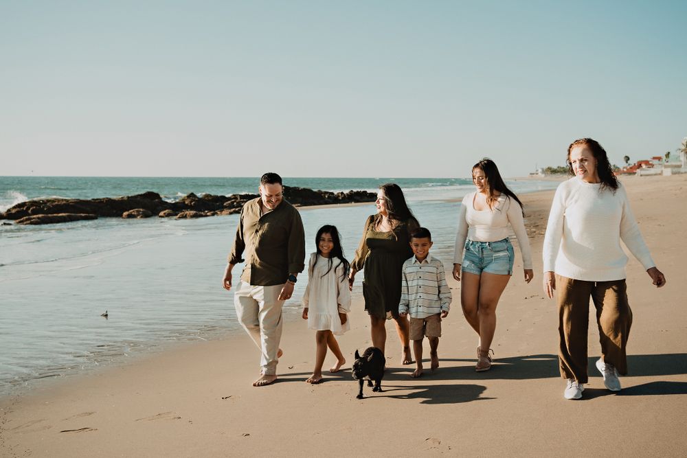 alking along the Mazatlán beach with their grandmother and beloved pet