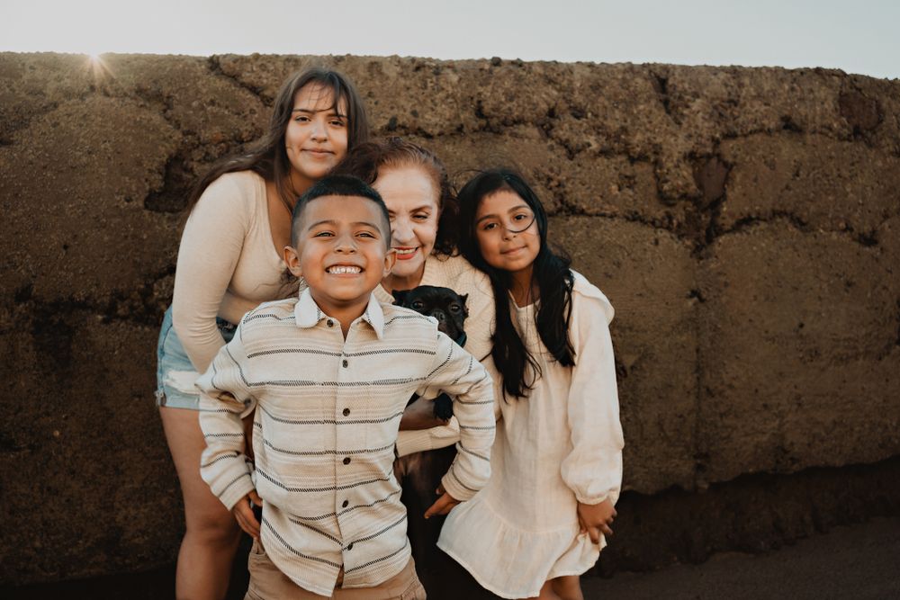 Grandchildren spending time with their grandmother during the family session