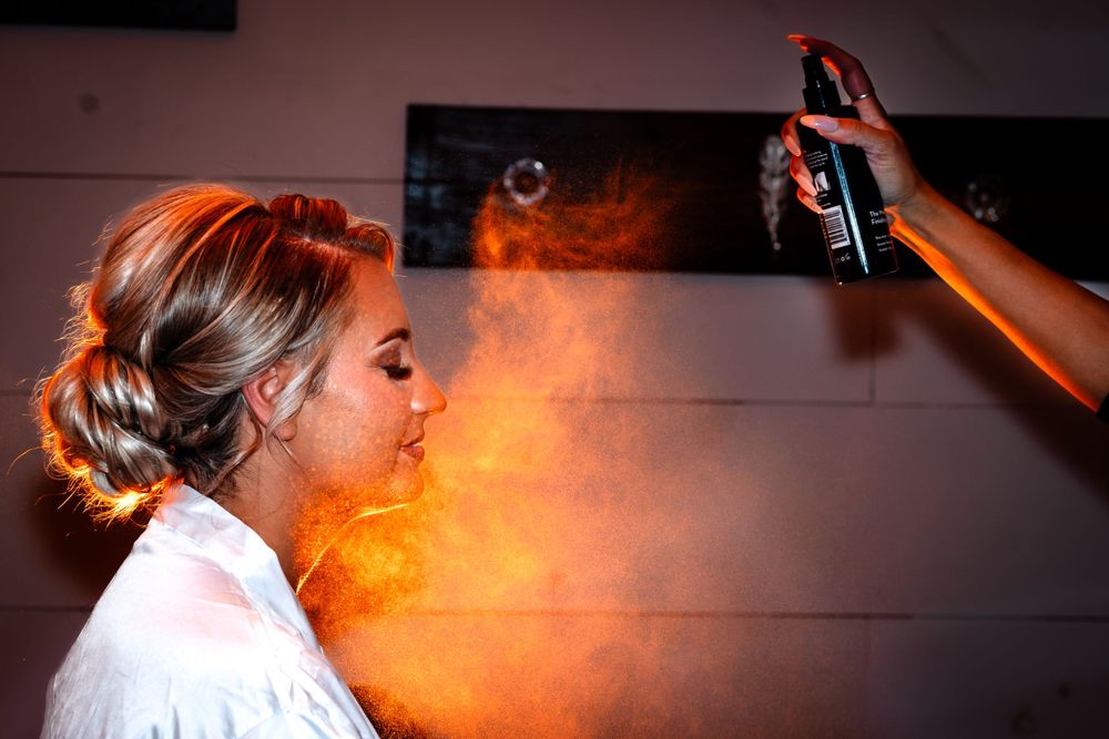 Warm-toned candid photographs from wedding morning preparations.